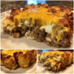 A close-up, layered view of a slice of cheesy tater tot meatloaf casserole showing ground meat, egg, and a melted cheddar topping.